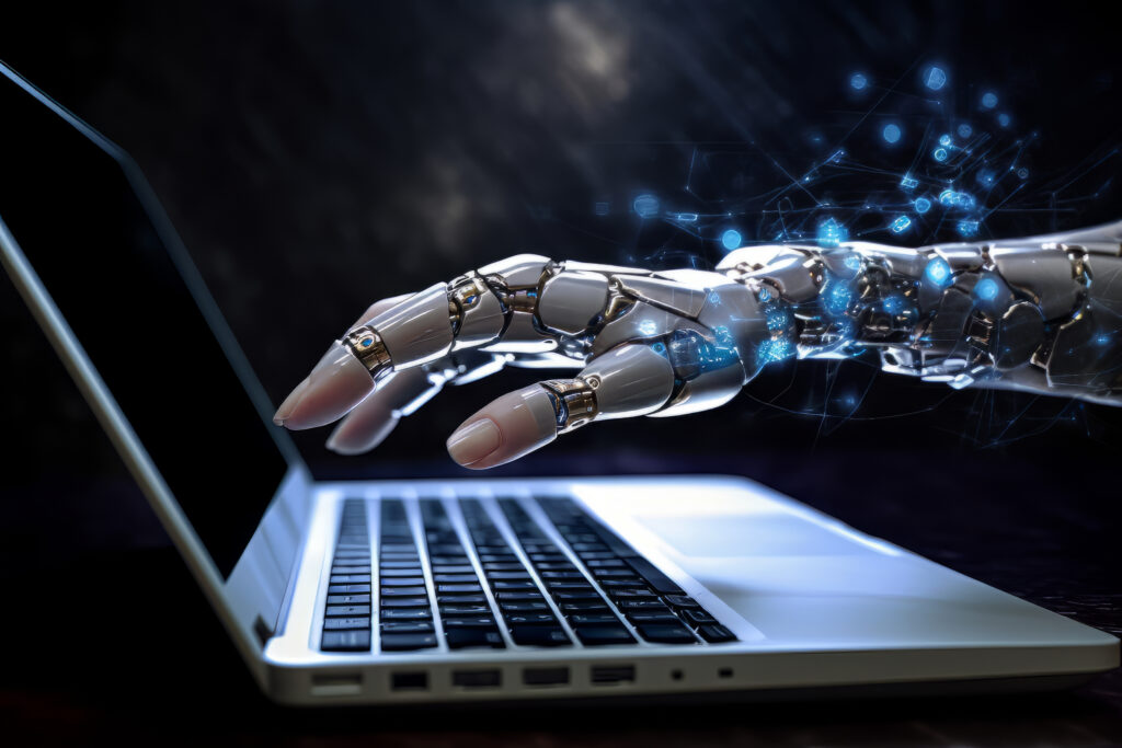 A robotic hand designing a website on a computer screen, symbolizing AI-driven automation.